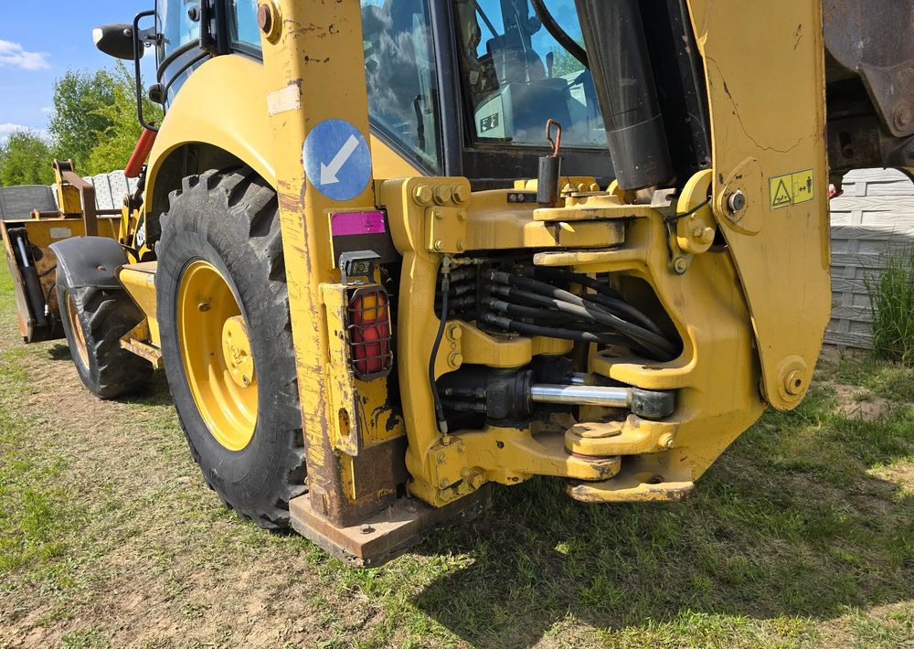 Backhoe loader Caterpillar: gambar 6