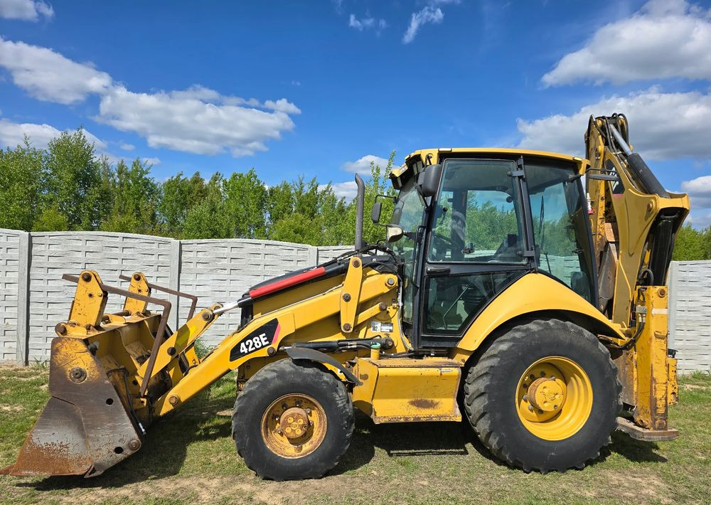 Backhoe loader Caterpillar: gambar 9
