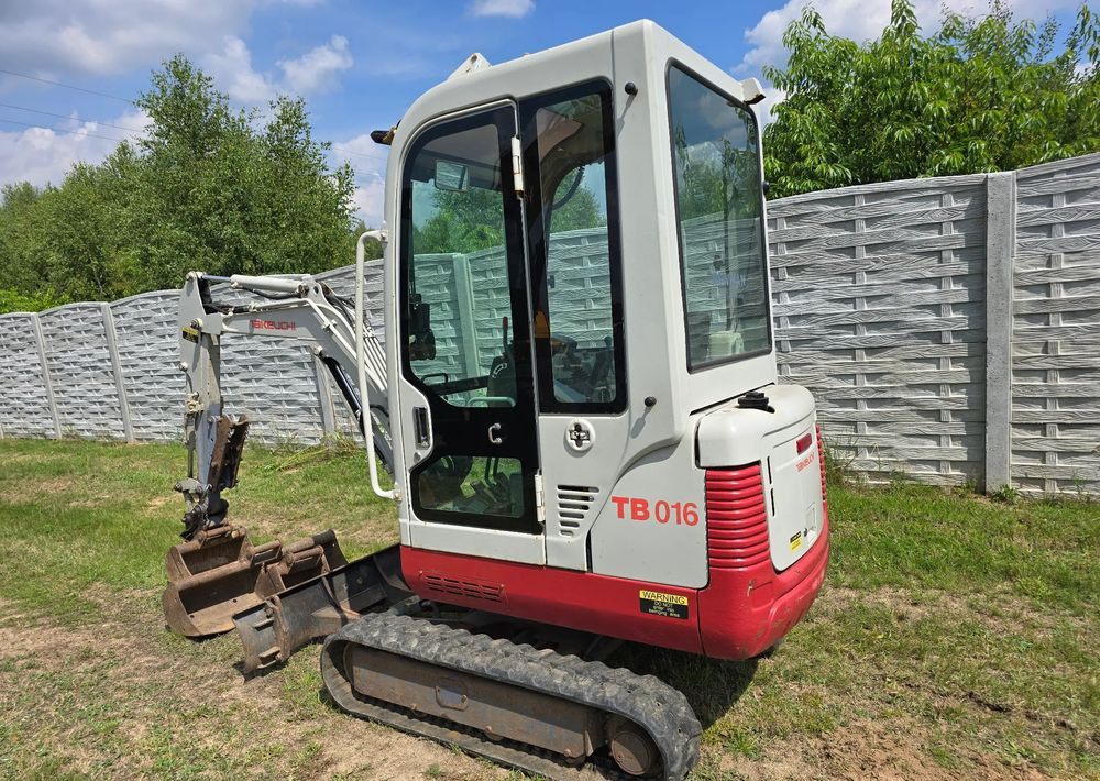 Takeuchi - Ekskavator mini: gambar 4 Takeuchi - Ekskavator mini: gambar 4