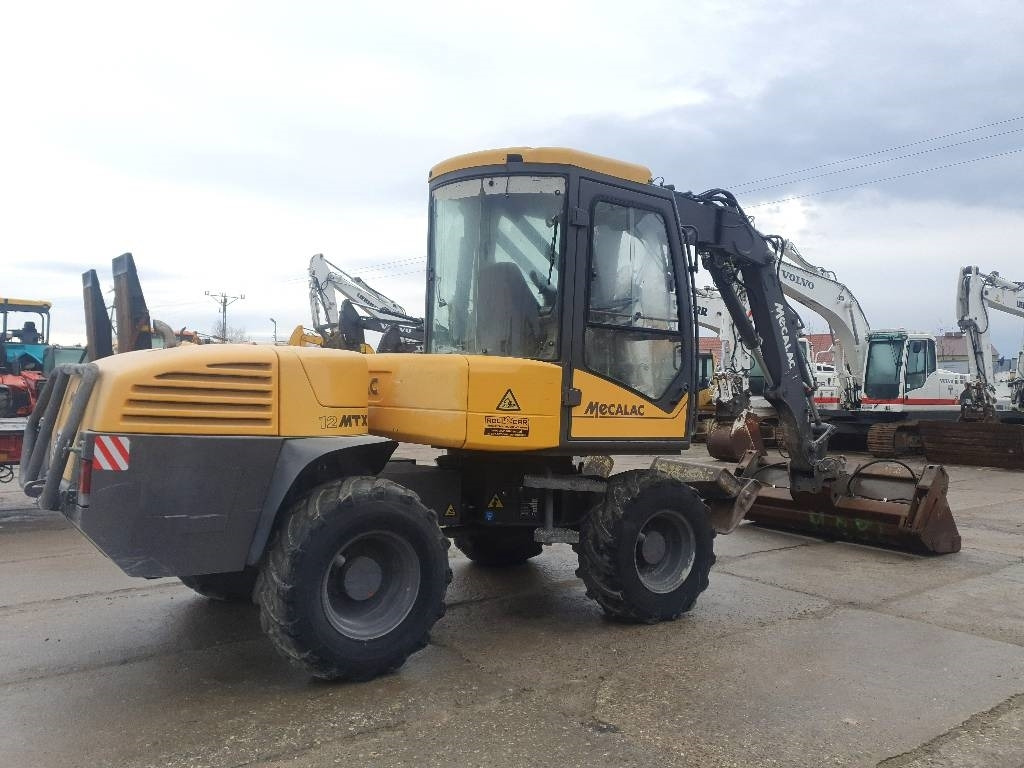 Mecalac 12 M TX - Ekskavator roda: gambar 5 Mecalac 12 M TX - Ekskavator roda: gambar 5