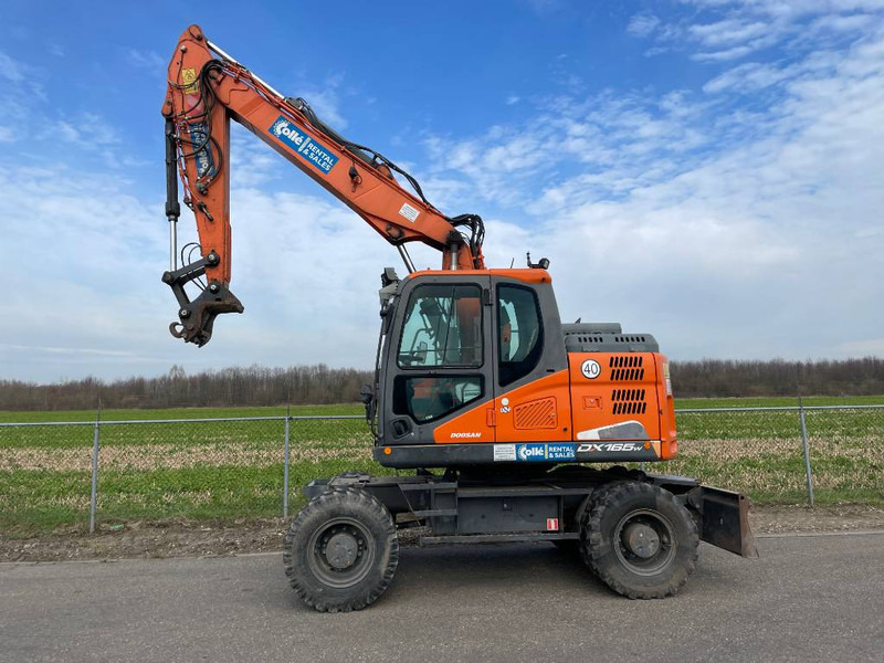 Doosan DX165W-5 - Ekskavator roda: gambar 1 Doosan DX165W-5 - Ekskavator roda: gambar 1