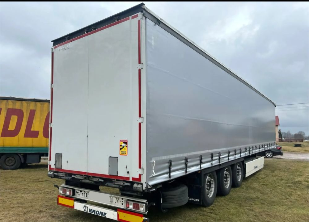 Krone STANDARD 2021 podnoszona oś OPONY 70% / STAN BARDZO DOBRY / OD PIERWSZEGO WŁAŚCICIELA / PALECIARA / TOP / sprowadzona z Niemiec !! - Semi-trailer dengan terpal samping: gambar 1 Krone STANDARD 2021 podnoszona oś OPONY 70% / STAN BARDZO DOBRY / OD PIERWSZEGO WŁAŚCICIELA / PALECIARA / TOP / sprowadzona z Niemiec !! - Semi-trailer dengan terpal samping: gambar 1