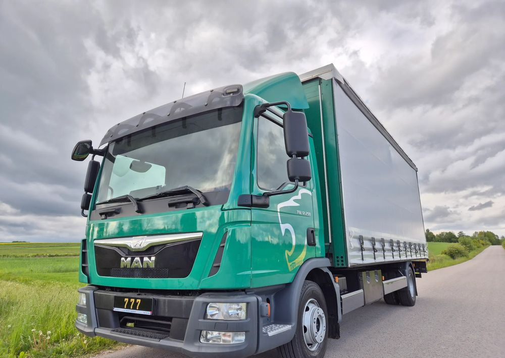 MAN TGL 12.250 6.2m AUTOMAT KLIMA z Niemiec ESP nowe opony EURO 6 / 4.75 rozstaw / zawiesie na wózek widłowy / TOP STAN / okazja nauka jazdy MOŻLIWOŚĆ DOSTOSOWANIA 12t - Truk dengan terpal samping: gambar 2 MAN TGL 12.250 6.2m AUTOMAT KLIMA z Niemiec ESP nowe opony EURO 6 / 4.75 rozstaw / zawiesie na wózek widłowy / TOP STAN / okazja nauka jazdy MOŻLIWOŚĆ DOSTOSOWANIA 12t - Truk dengan terpal samping: gambar 2