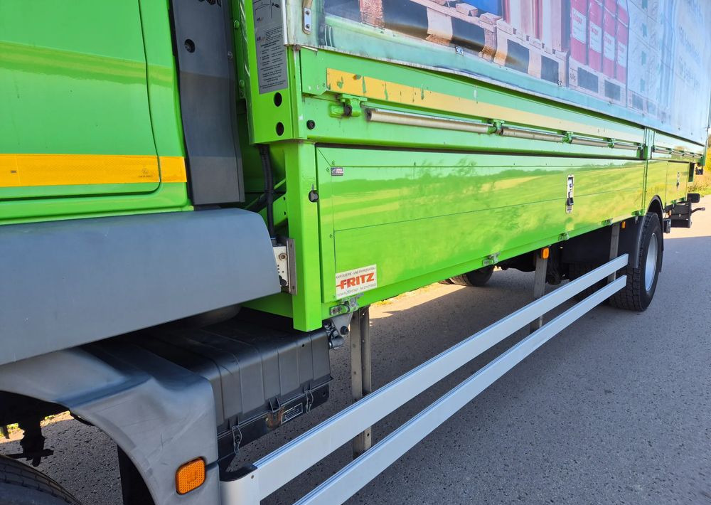 MAN Tgm 18.320 FULL SERWIS UNIKAT TOP ORYGINALNY PRZEBIEG z Niemiec AUTOMAT WINDA ACC Pirelli klima postojowa 18.250 18.290 15.250 15.290 15.320 - Truk dengan terpal samping: gambar 5 MAN Tgm 18.320 FULL SERWIS UNIKAT TOP ORYGINALNY PRZEBIEG z Niemiec AUTOMAT WINDA ACC Pirelli klima postojowa 18.250 18.290 15.250 15.290 15.320 - Truk dengan terpal samping: gambar 5