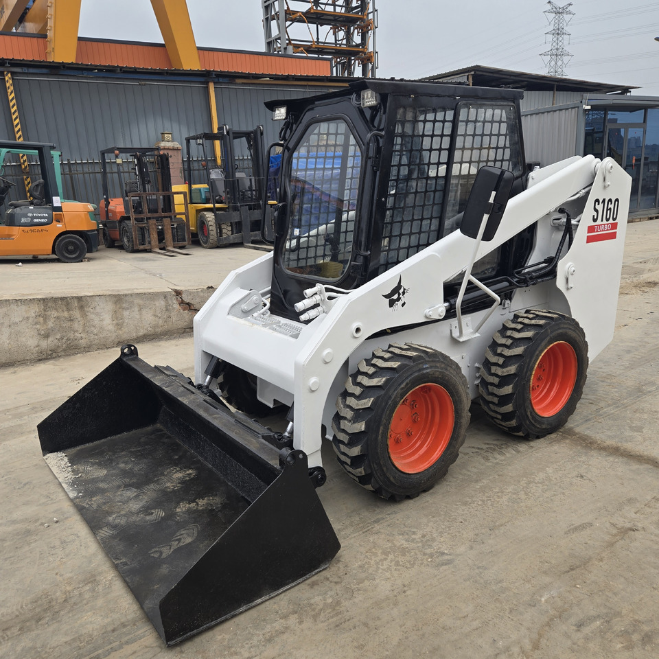 BOBCAT S160 - Skid steer: gambar 1 BOBCAT S160 - Skid steer: gambar 1