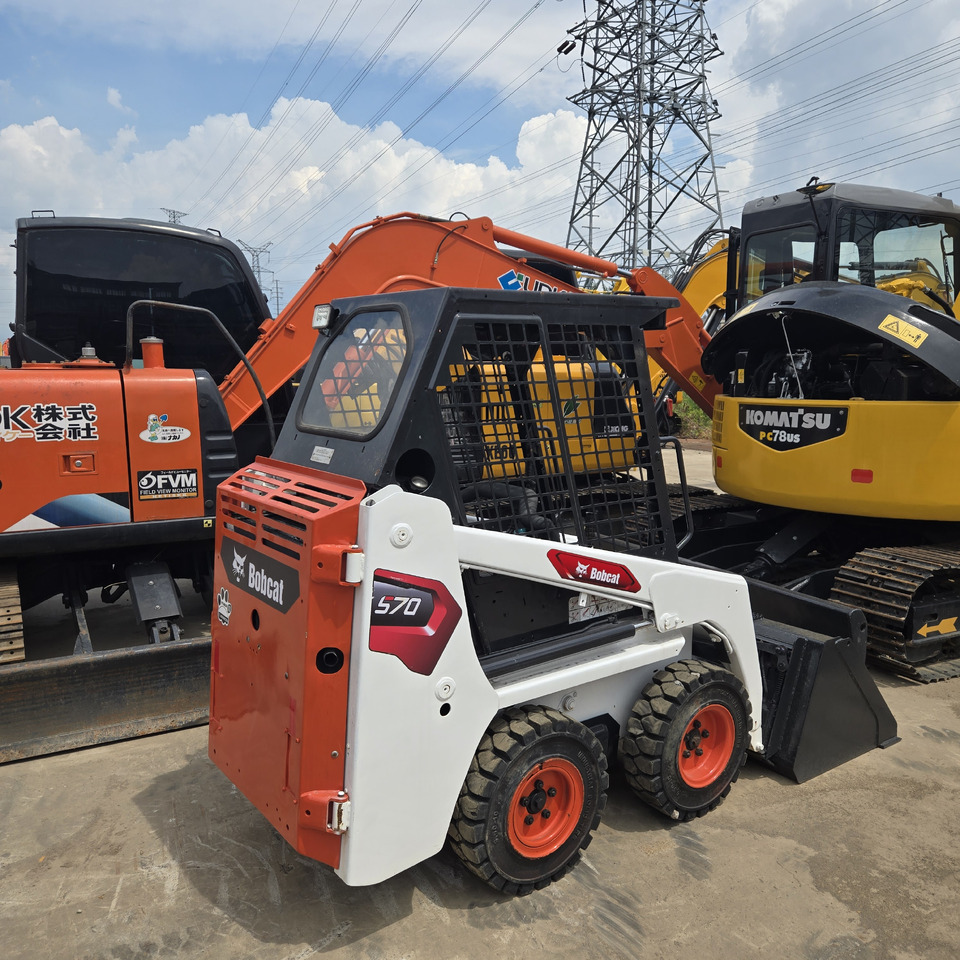 BOBCAT S70 - Skid steer: gambar 1 BOBCAT S70 - Skid steer: gambar 1