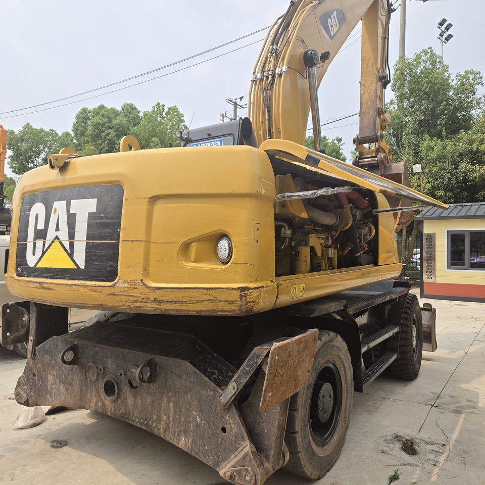 CAT M320D2 - Ekskavator roda: gambar 4 CAT M320D2 - Ekskavator roda: gambar 4