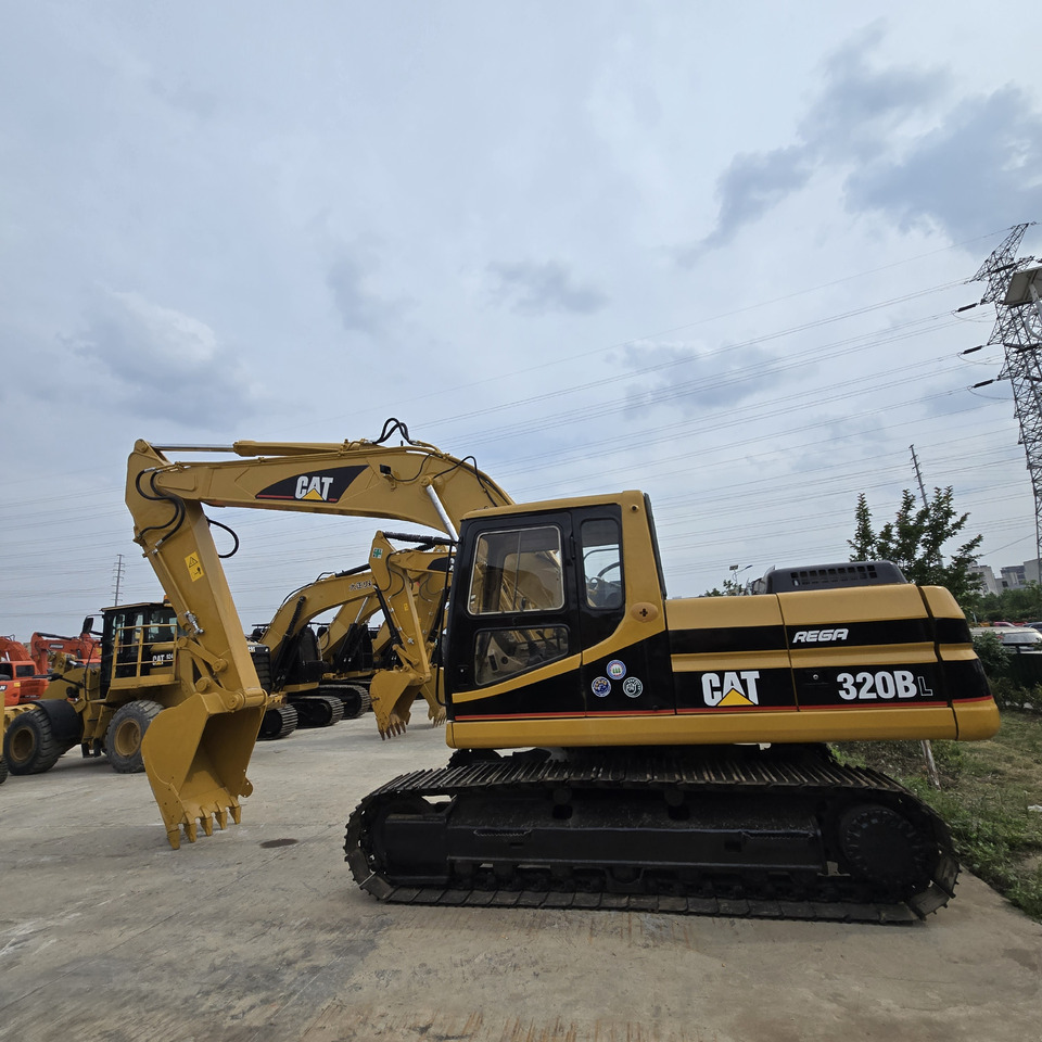 CATERPILLAR 320BL - Ekskavator perayap: gambar 2 CATERPILLAR 320BL - Ekskavator perayap: gambar 2