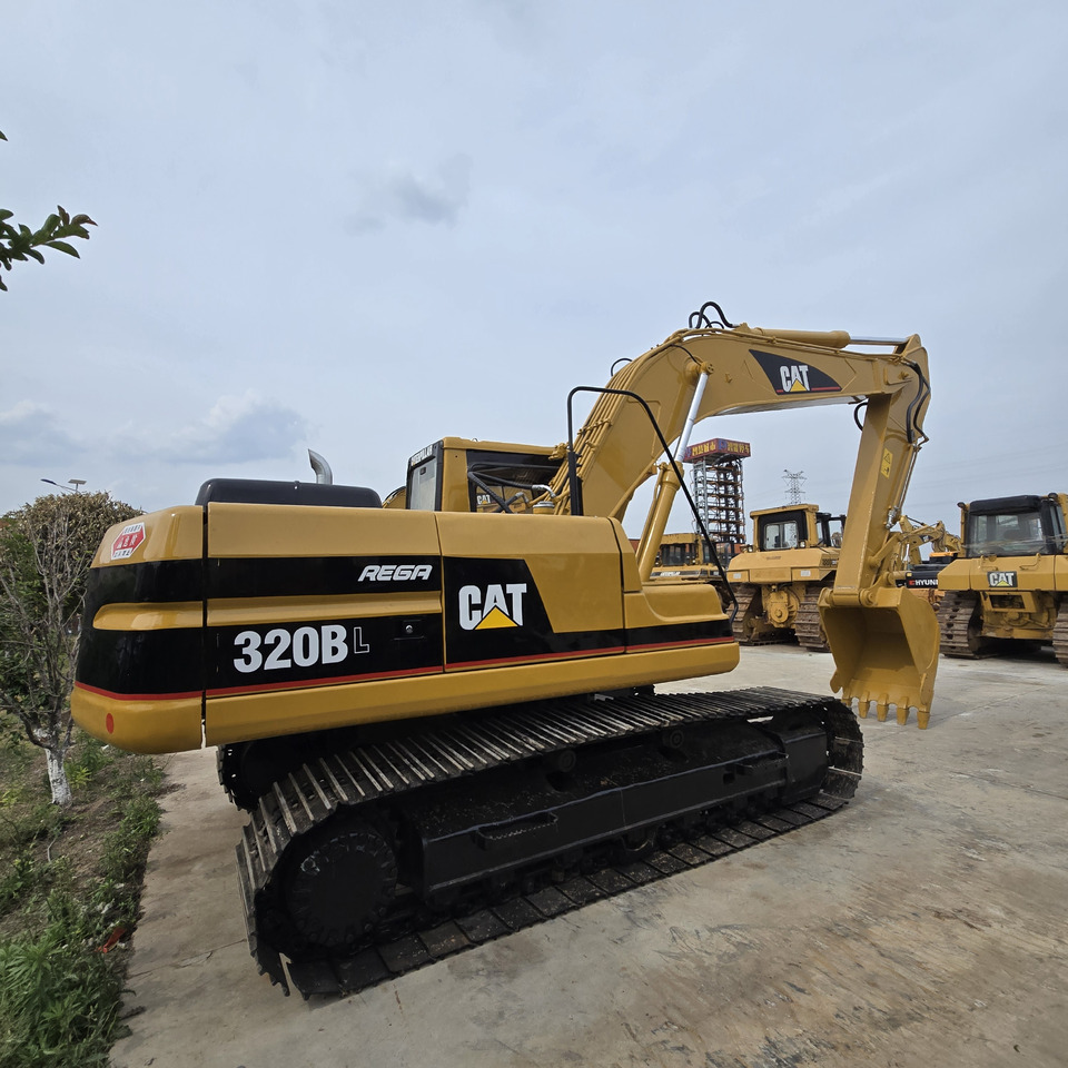 CATERPILLAR 320BL - Ekskavator perayap: gambar 4 CATERPILLAR 320BL - Ekskavator perayap: gambar 4