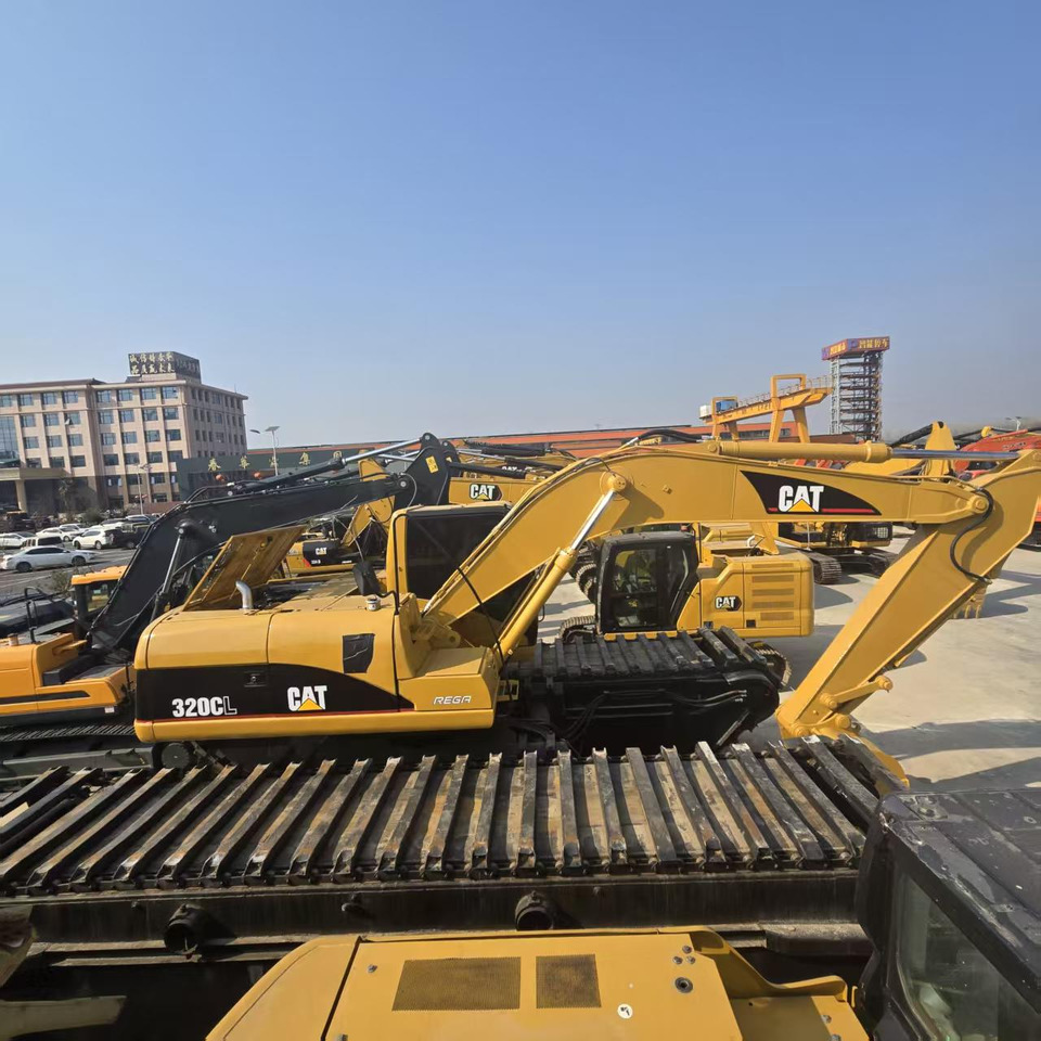 CATERPILLAR 320C - Ekskavator amfibi: gambar 4 CATERPILLAR 320C - Ekskavator amfibi: gambar 4