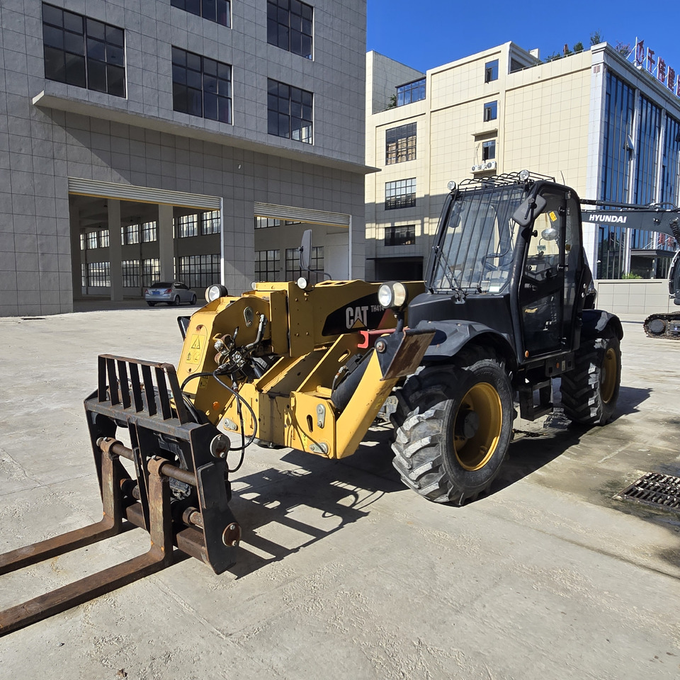 CATERPILLAR TH414 - Boom teleskopik: gambar 5 CATERPILLAR TH414 - Boom teleskopik: gambar 5