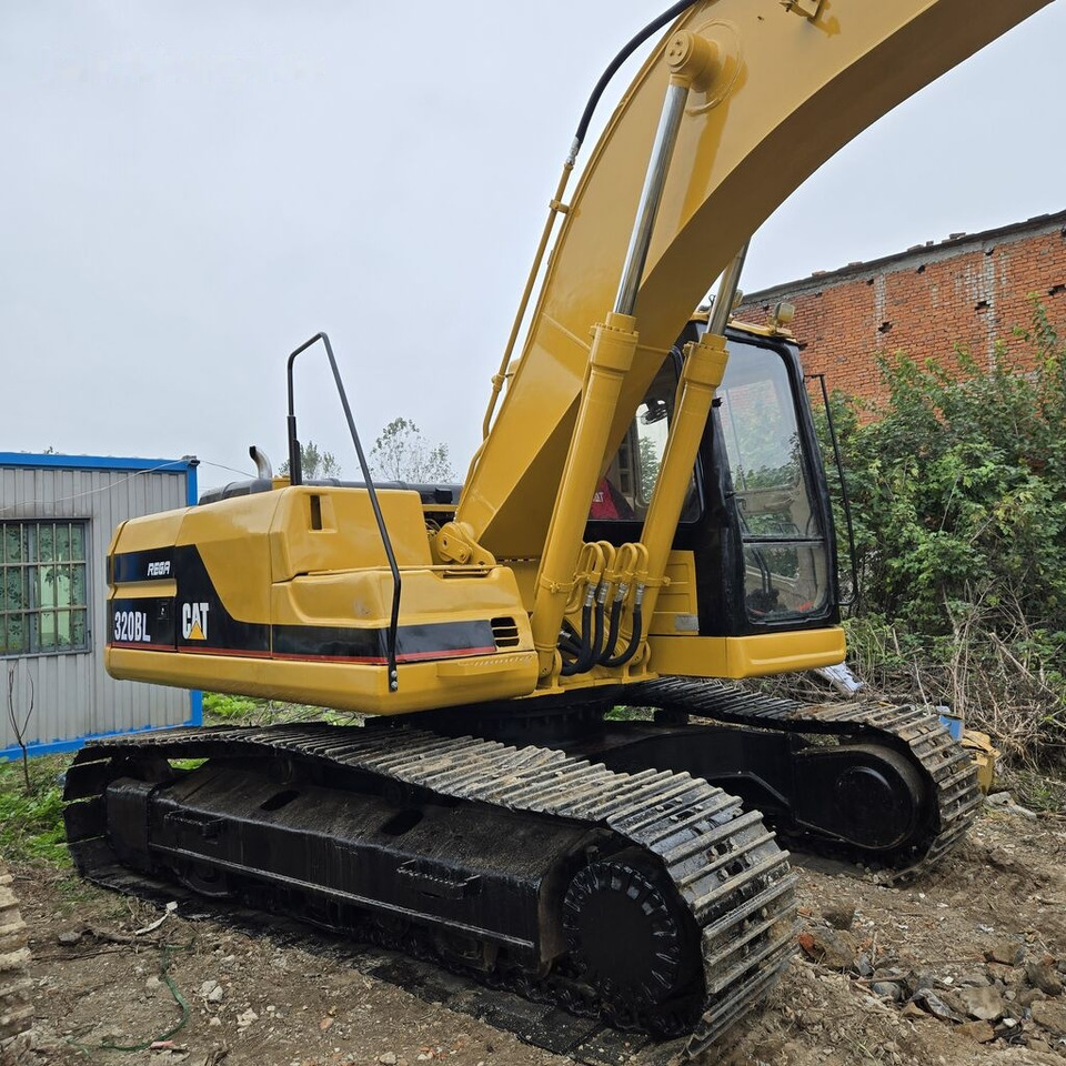 Caterpillar 320BL - Ekskavator perayap: gambar 5 Caterpillar 320BL - Ekskavator perayap: gambar 5