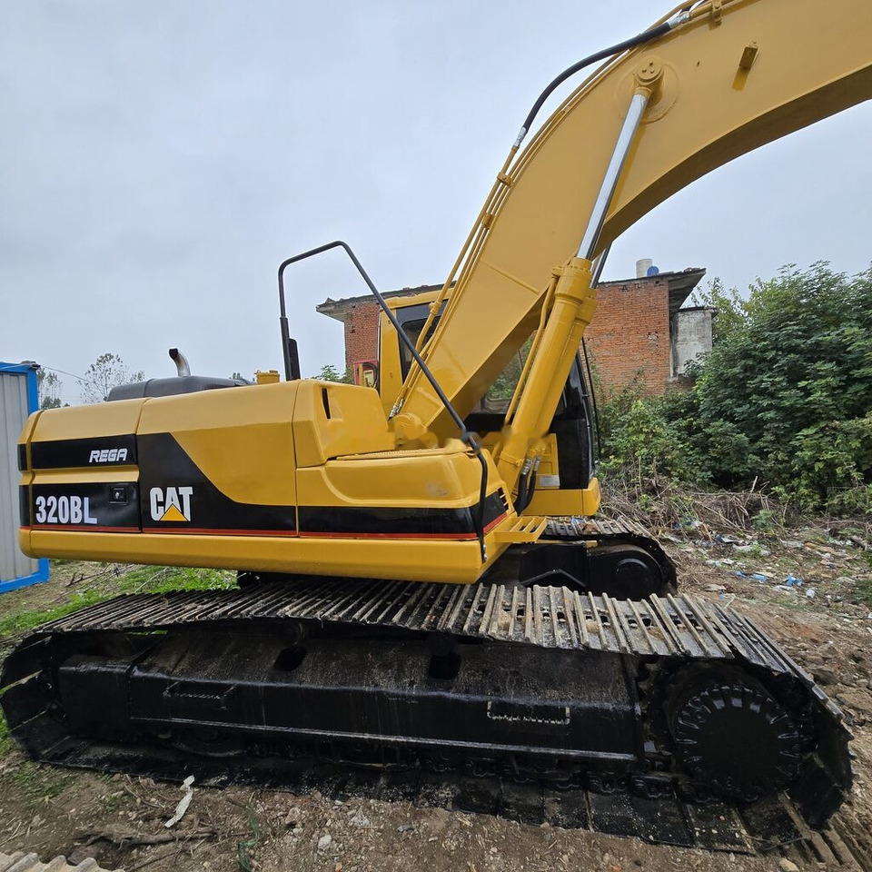 Caterpillar 320BL - Ekskavator perayap: gambar 1 Caterpillar 320BL - Ekskavator perayap: gambar 1