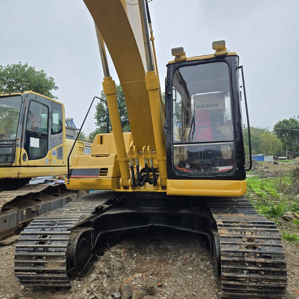Caterpillar 320BL - Ekskavator perayap: gambar 4 Caterpillar 320BL - Ekskavator perayap: gambar 4