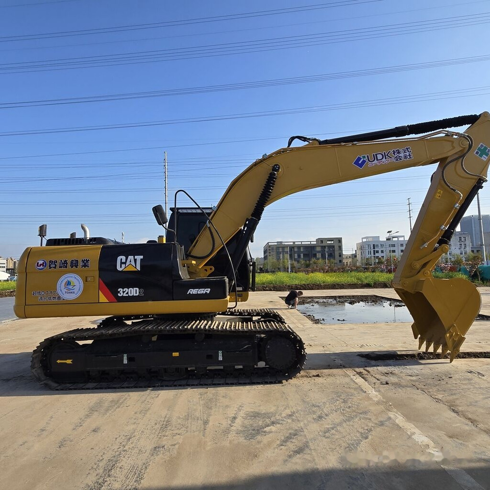 Caterpillar 320D2 - Ekskavator perayap: gambar 5 Caterpillar 320D2 - Ekskavator perayap: gambar 5
