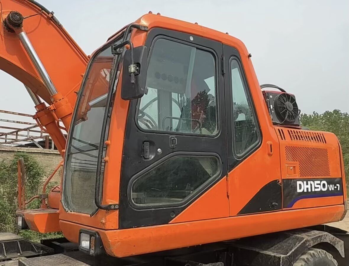 DOOSAN DH150W-7 - Ekskavator roda: gambar 5 DOOSAN DH150W-7 - Ekskavator roda: gambar 5