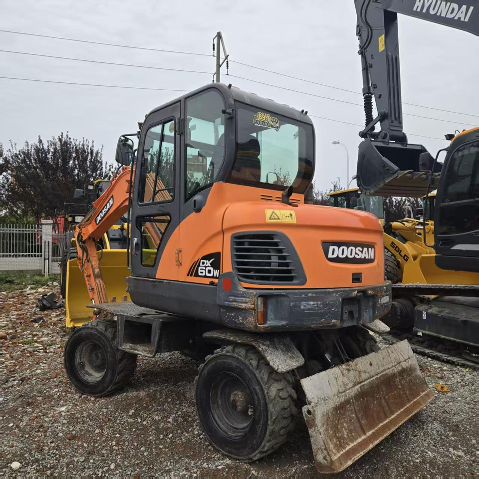 DOOSAN DX60W - Ekskavator roda: gambar 5 DOOSAN DX60W - Ekskavator roda: gambar 5