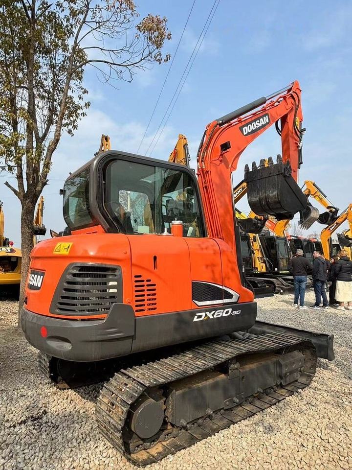 Doosan DX60 - Ekskavator mini: gambar 1 Doosan DX60 - Ekskavator mini: gambar 1
