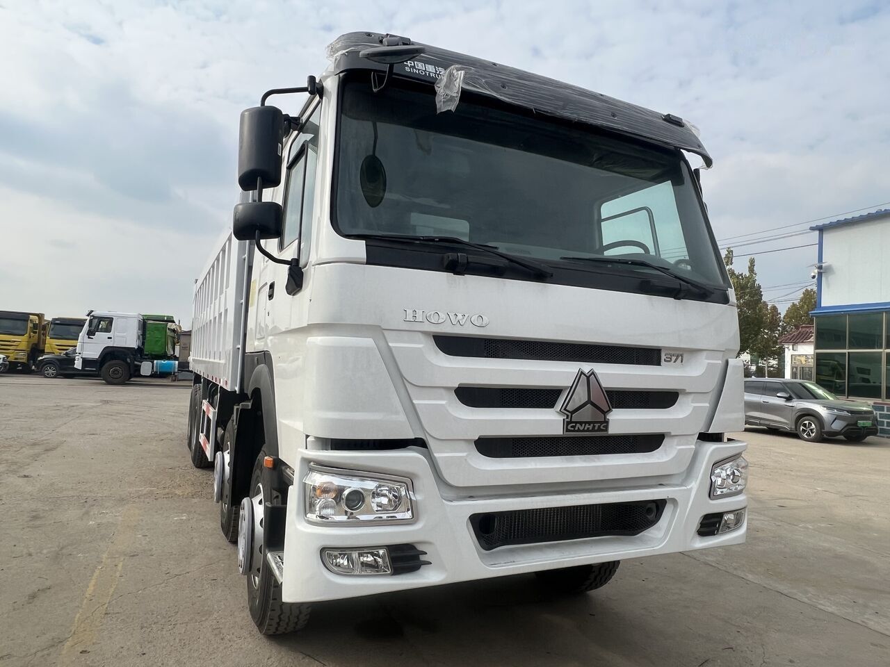 Truk jungkit Sinotruk Howo 8*4: gambar 14 Truk jungkit Sinotruk Howo 8*4: gambar 14