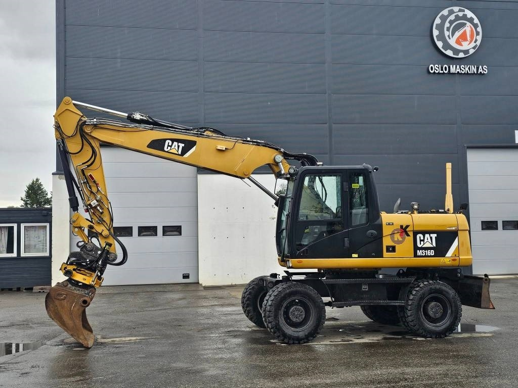 CAT M 316 D  - Ekskavator roda: gambar 2 CAT M 316 D  - Ekskavator roda: gambar 2