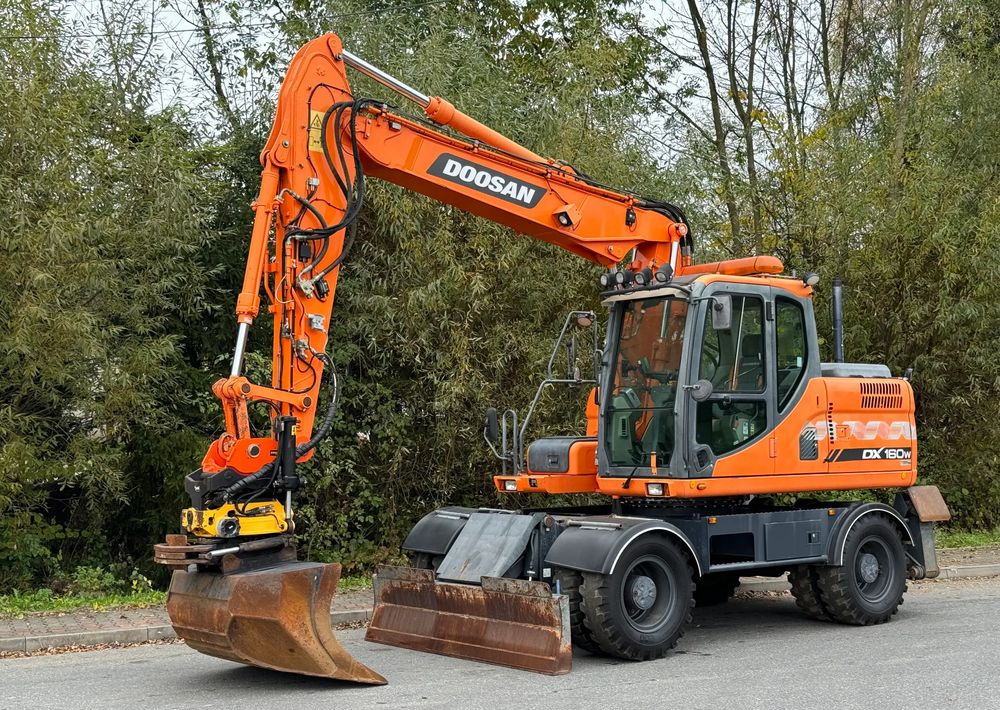 Doosan * DOOSAN DX160W *ROTOTILT* GPS 2D Leica * Sprowadzona * Stan Perfekcyjny * Koparka Kołowa * - Ekskavator roda: gambar 1 Doosan * DOOSAN DX160W *ROTOTILT* GPS 2D Leica * Sprowadzona * Stan Perfekcyjny * Koparka Kołowa * - Ekskavator roda: gambar 1