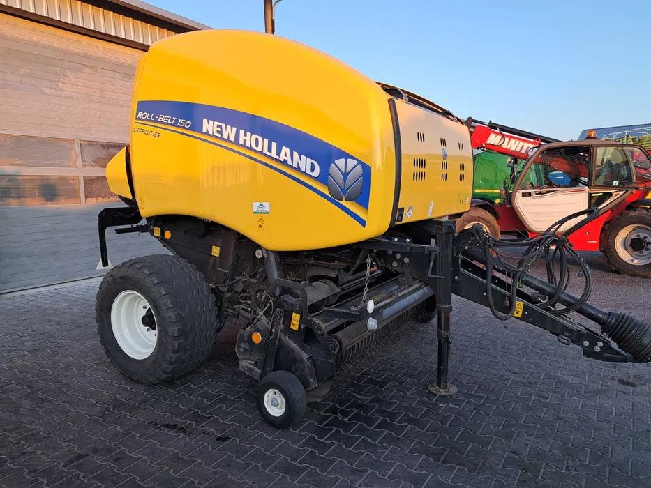 New Holland ROLL-BELT 150 cropcutter - Baler bulat: gambar 1 New Holland ROLL-BELT 150 cropcutter - Baler bulat: gambar 1