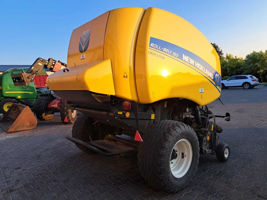 New Holland ROLL-BELT 150 cropcutter - Baler bulat: gambar 3 New Holland ROLL-BELT 150 cropcutter - Baler bulat: gambar 3