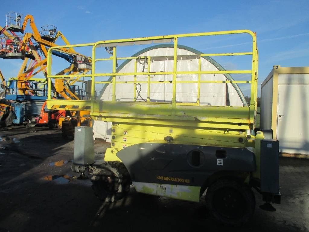 Haulotte Compact 12 DX - Scissor lifts: gambar 2 Haulotte Compact 12 DX - Scissor lifts: gambar 2