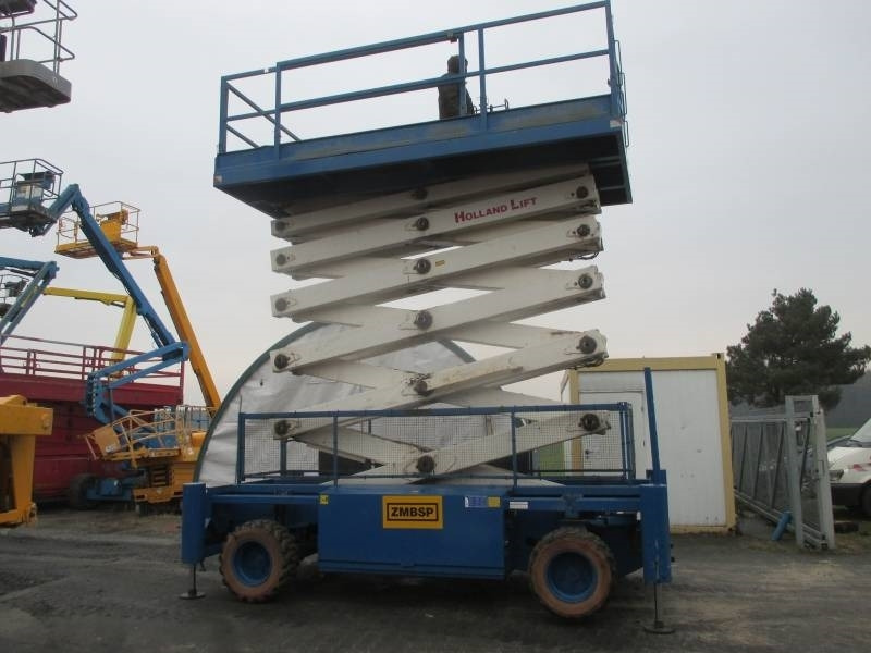 Holland Lift B 195 DL 25 - Scissor lifts: gambar 1 Holland Lift B 195 DL 25 - Scissor lifts: gambar 1