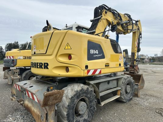 Liebherr A 914 COMPACT - Ekskavator roda: gambar 1 Liebherr A 914 COMPACT - Ekskavator roda: gambar 1