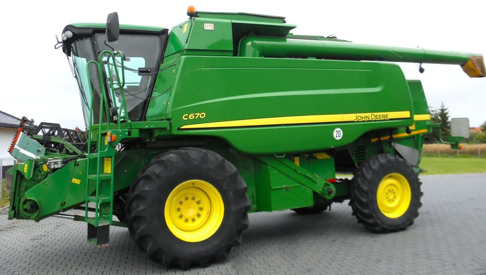 John Deere C 670 2008 Rok, heder 7,6m, 1900 mtg, Nie Malowany, Stan Idealny - Pemanen gabungan: gambar 1 John Deere C 670 2008 Rok, heder 7,6m, 1900 mtg, Nie Malowany, Stan Idealny - Pemanen gabungan: gambar 1