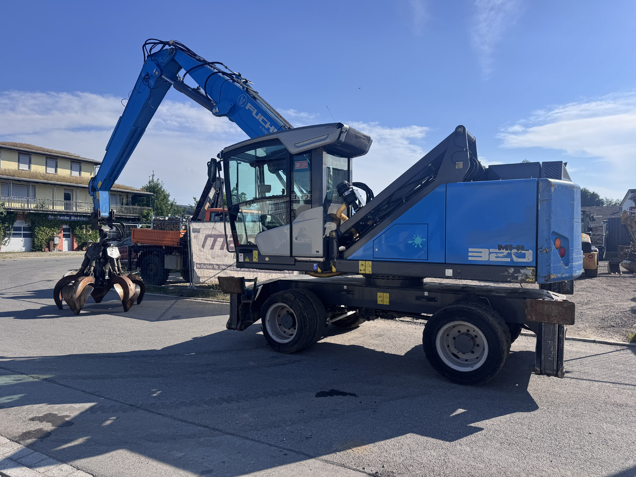 FUCHS MHL 320 F - Mesin pengisi: gambar 1 FUCHS MHL 320 F - Mesin pengisi: gambar 1