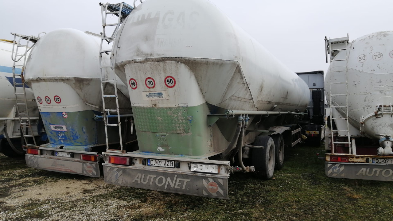 FELDBINDER Tank/Silo 57,000 l 4 Compartments for Powders/Feed/Water//Liquid Fertilizer/etc. - Semi trailer silo: gambar 1 FELDBINDER Tank/Silo 57,000 l 4 Compartments for Powders/Feed/Water//Liquid Fertilizer/etc. - Semi trailer silo: gambar 1