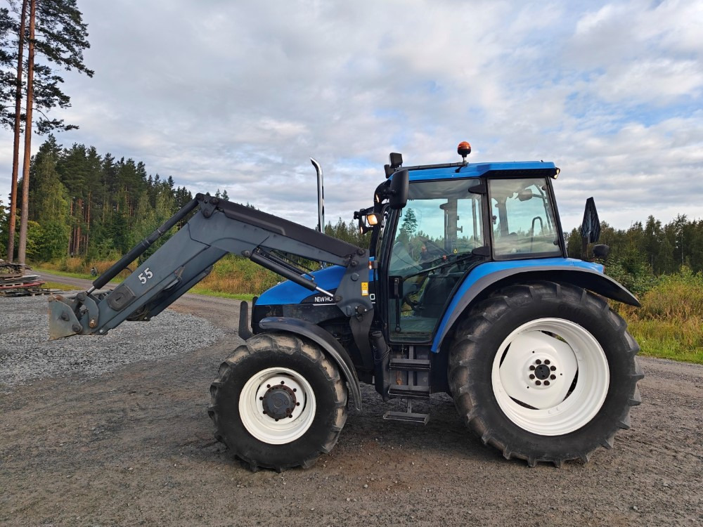 New Holland TS100, ES vaihteisto, ilmastointi, etukuormaaja Ålö Q55, katso video! - Traktor: gambar 2 New Holland TS100, ES vaihteisto, ilmastointi, etukuormaaja Ålö Q55, katso video! - Traktor: gambar 2