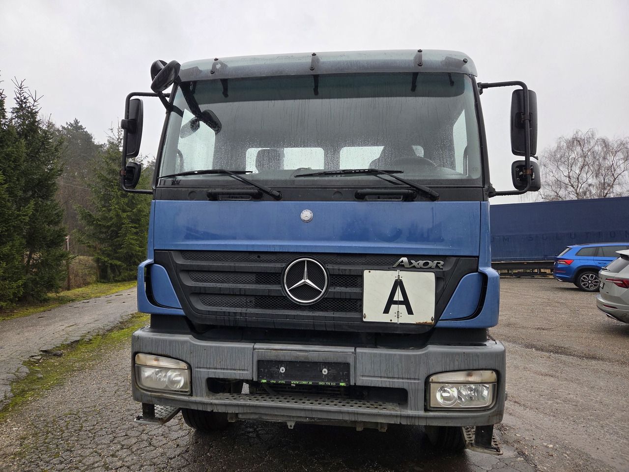 MERCEDES-BENZ AXOR 1828 CHAIN CONTAINER MEILLER - Truk skip loader: gambar 2 MERCEDES-BENZ AXOR 1828 CHAIN CONTAINER MEILLER - Truk skip loader: gambar 2