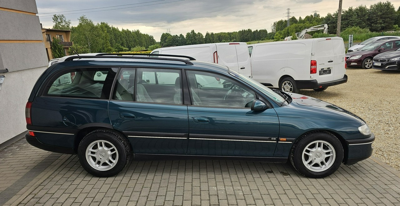 Opel Omega B 2,5 v6 *automat* napęd tył *welury* - Mobil: gambar 5 Opel Omega B 2,5 v6 *automat* napęd tył *welury* - Mobil: gambar 5