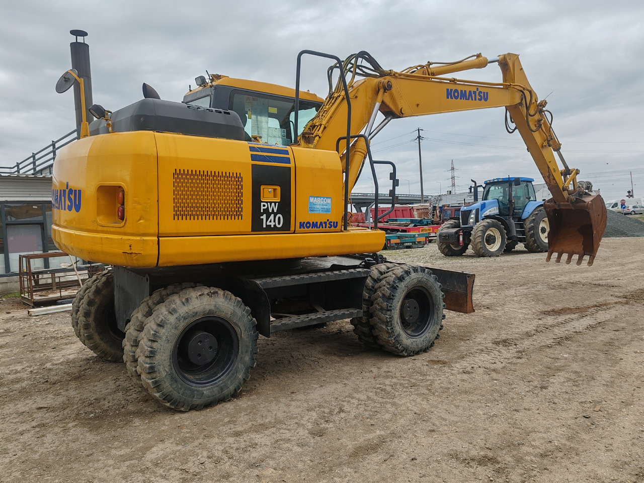 Komatsu PW140-7 - Ekskavator roda: gambar 3 Komatsu PW140-7 - Ekskavator roda: gambar 3