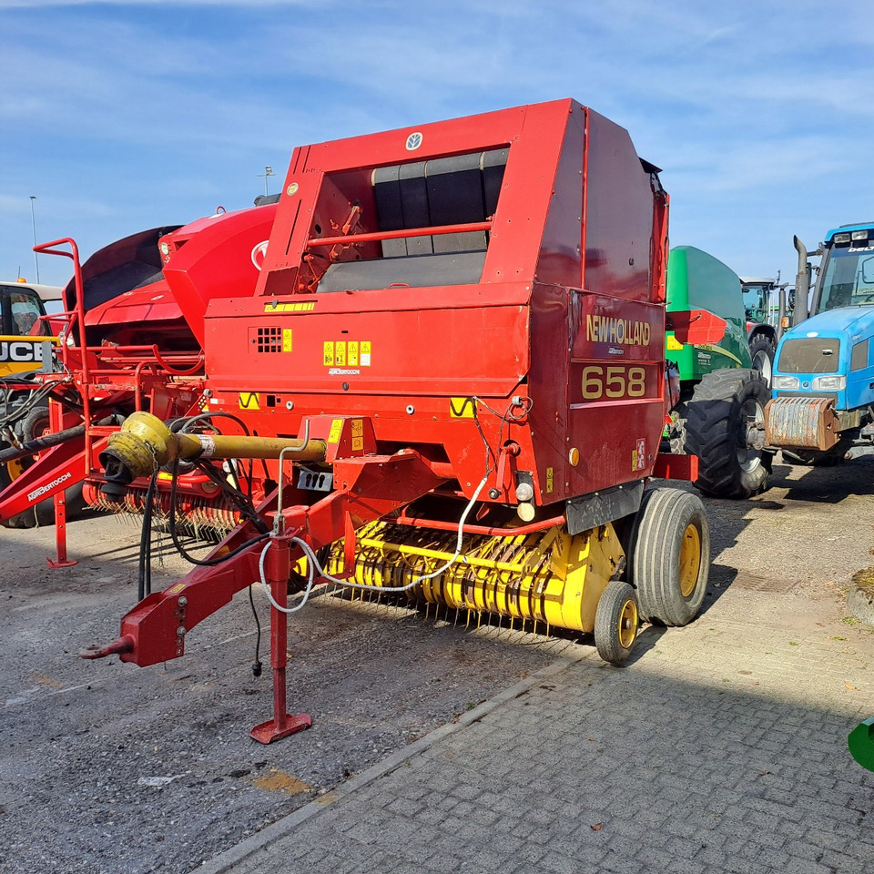 ROTOPRESSA NEW HOLLAND 658 - Baler bulat: gambar 1 ROTOPRESSA NEW HOLLAND 658 - Baler bulat: gambar 1