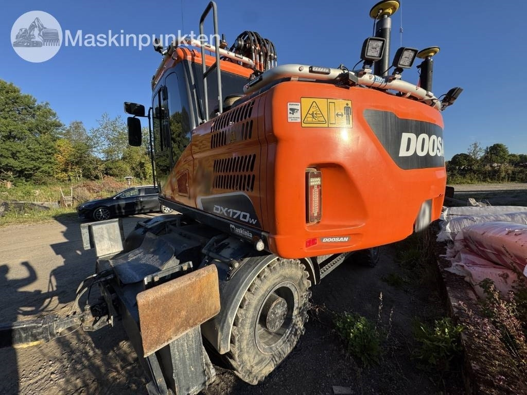 Doosan DX 170 W-5 + Tippvagn + Redskap - Ekskavator roda: gambar 3 Doosan DX 170 W-5 + Tippvagn + Redskap - Ekskavator roda: gambar 3
