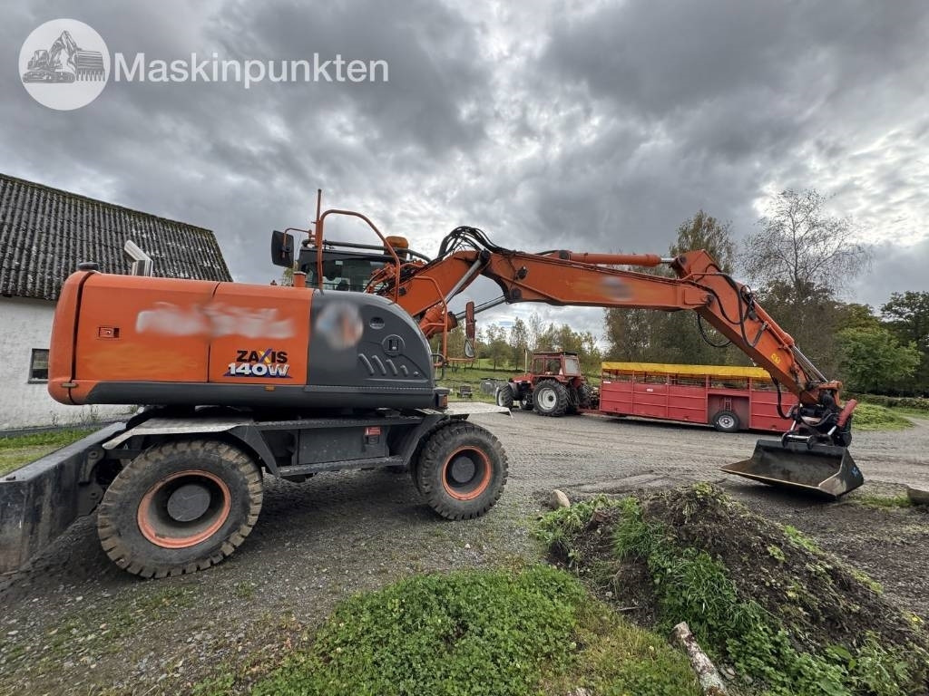 Hitachi ZX 140 W-3 - Ekskavator roda: gambar 4 Hitachi ZX 140 W-3 - Ekskavator roda: gambar 4