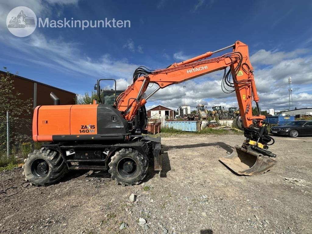 Hitachi ZX 140 W-5B - Ekskavator roda: gambar 4 Hitachi ZX 140 W-5B - Ekskavator roda: gambar 4