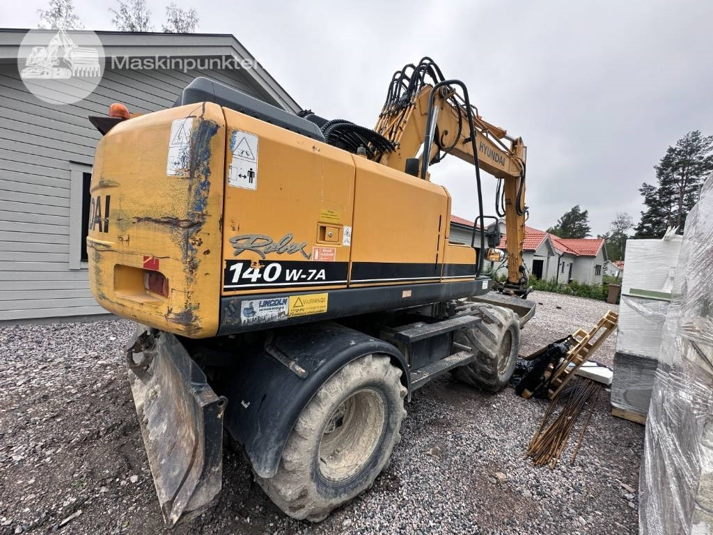 Hyundai Robex 140 W-7 A - Ekskavator roda: gambar 4 Hyundai Robex 140 W-7 A - Ekskavator roda: gambar 4