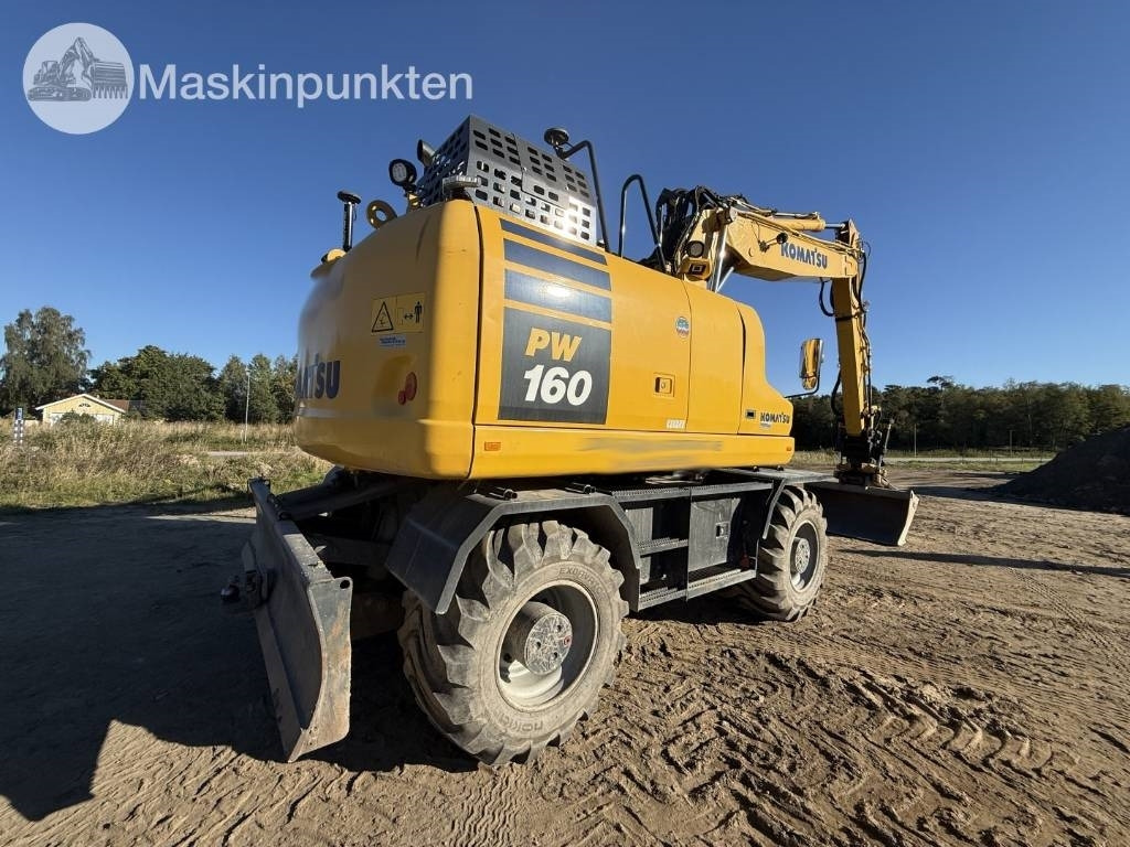 Komatsu PW 160 - Ekskavator roda: gambar 5 Komatsu PW 160 - Ekskavator roda: gambar 5