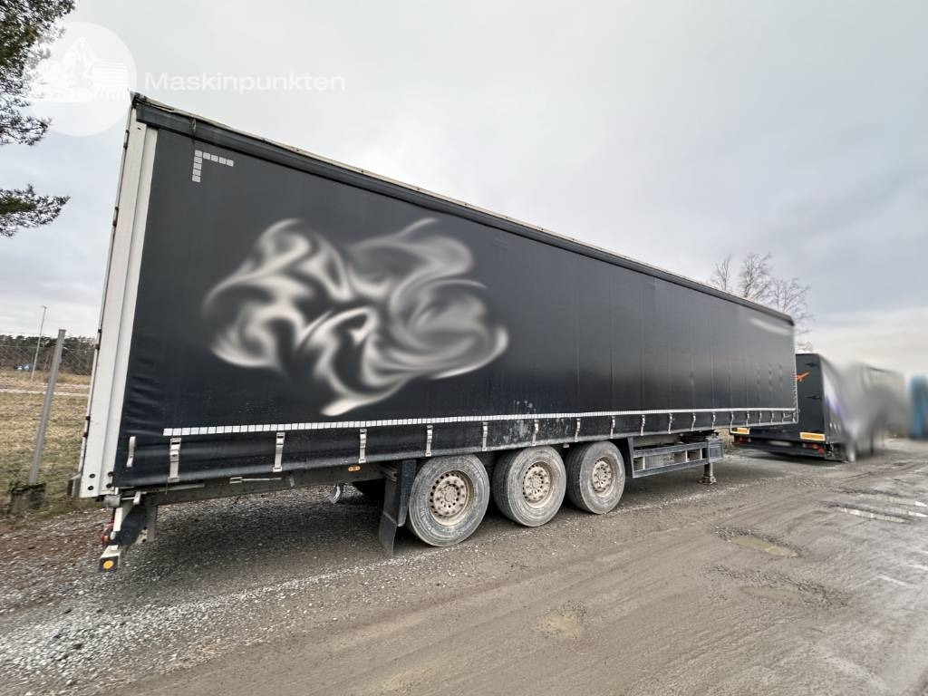 Schmitz Gardintrailer - Semi-trailer dengan terpal samping: gambar 1 Schmitz Gardintrailer - Semi-trailer dengan terpal samping: gambar 1