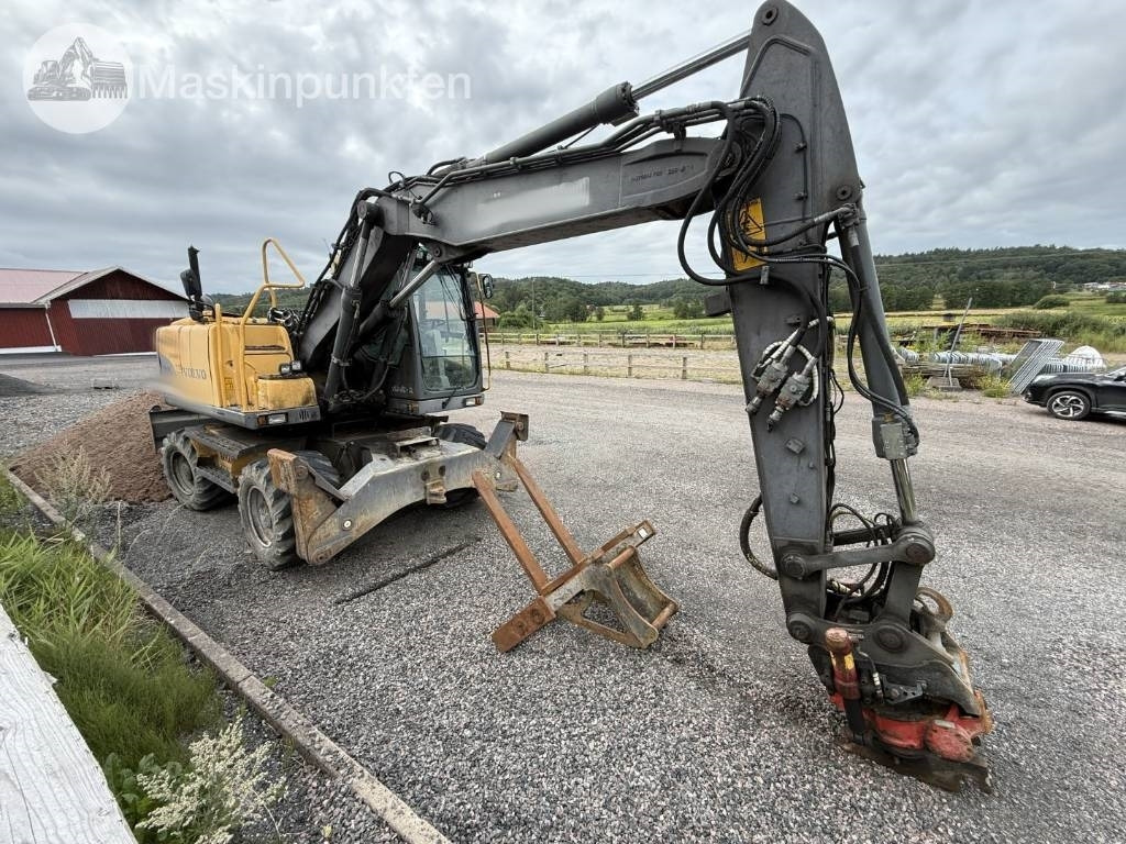 Volvo EW 140 C - Ekskavator roda: gambar 3 Volvo EW 140 C - Ekskavator roda: gambar 3