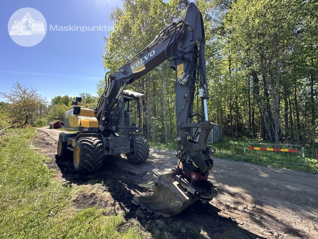 Volvo EW 140 D - Ekskavator roda: gambar 1 Volvo EW 140 D - Ekskavator roda: gambar 1