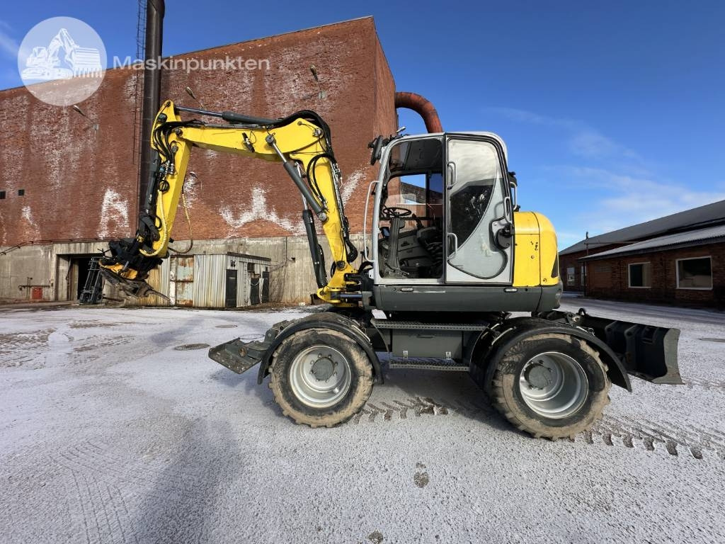 Wacker Neuson EW 100 - Ekskavator roda: gambar 1 Wacker Neuson EW 100 - Ekskavator roda: gambar 1