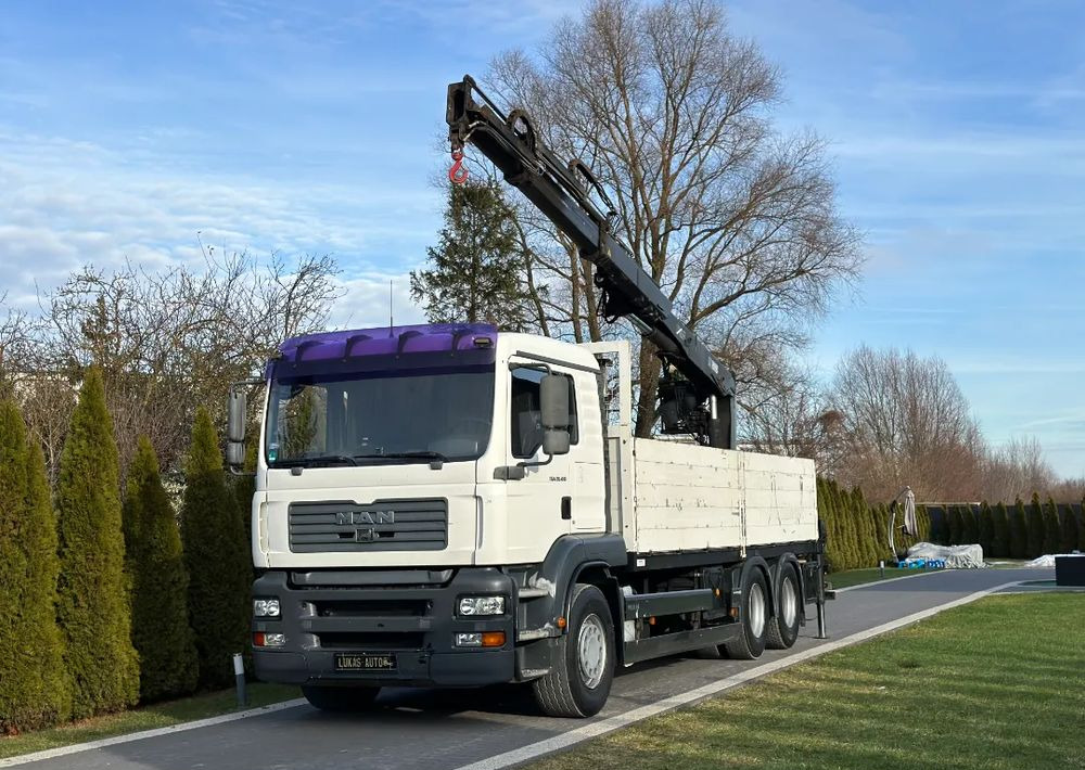 MAN TGA 24.410 6x4 HIAB MANUAL - Truk flatbed, Truk derek: gambar 1 MAN TGA 24.410 6x4 HIAB MANUAL - Truk flatbed, Truk derek: gambar 1