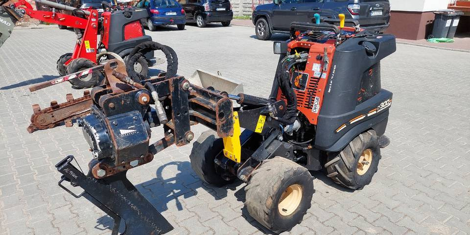 Ditch Witch R300 koparka łańcuchowa pługoukładacz - Mesin penggali parit: gambar 1 Ditch Witch R300 koparka łańcuchowa pługoukładacz - Mesin penggali parit: gambar 1