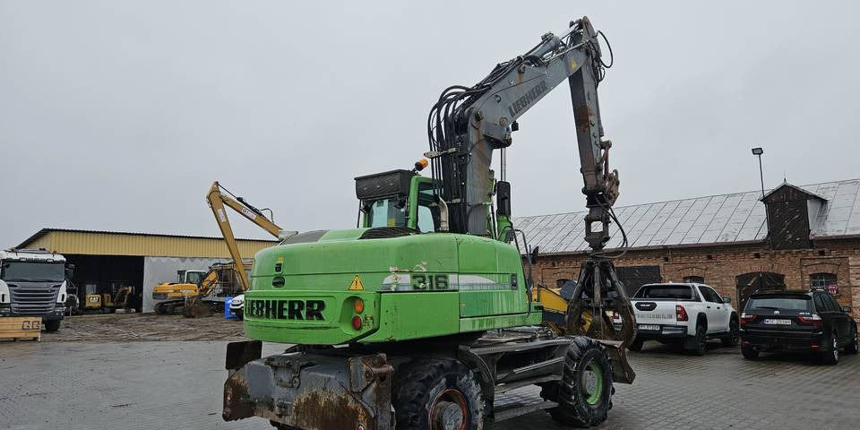 Koparka kołowa Liebherr A 316 Litronic chwytak podpory pług - Ekskavator roda: gambar 5 Koparka kołowa Liebherr A 316 Litronic chwytak podpory pług - Ekskavator roda: gambar 5